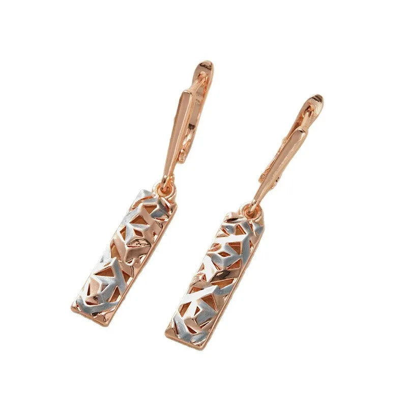 Two-tone rectangular hollow stud earrings for women, made from alloy with an electroplated finish.