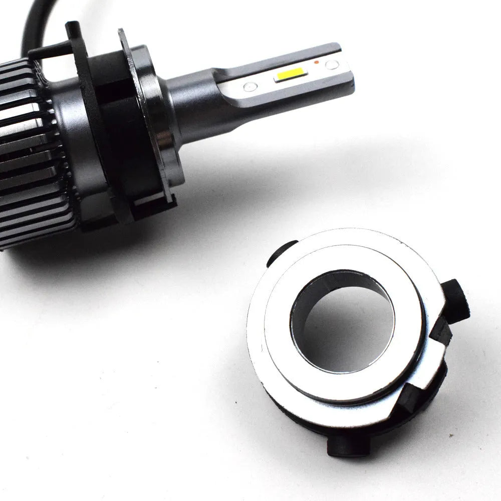 Black ABS plastic car headlight card holder for Nissan and Kia models showing compact size