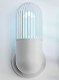 Portable capsule ultraviolet disinfection lamp in black, brown, green or white with compact 52x52x136mm body