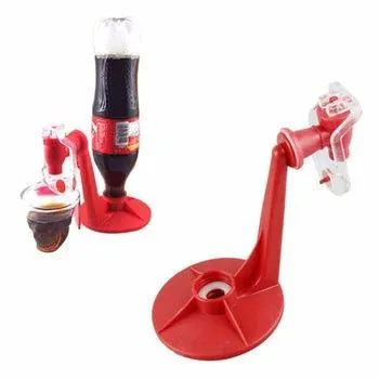 Red plastic Magic Tap soda dispenser attached to 2-litre bottle with push-button tap