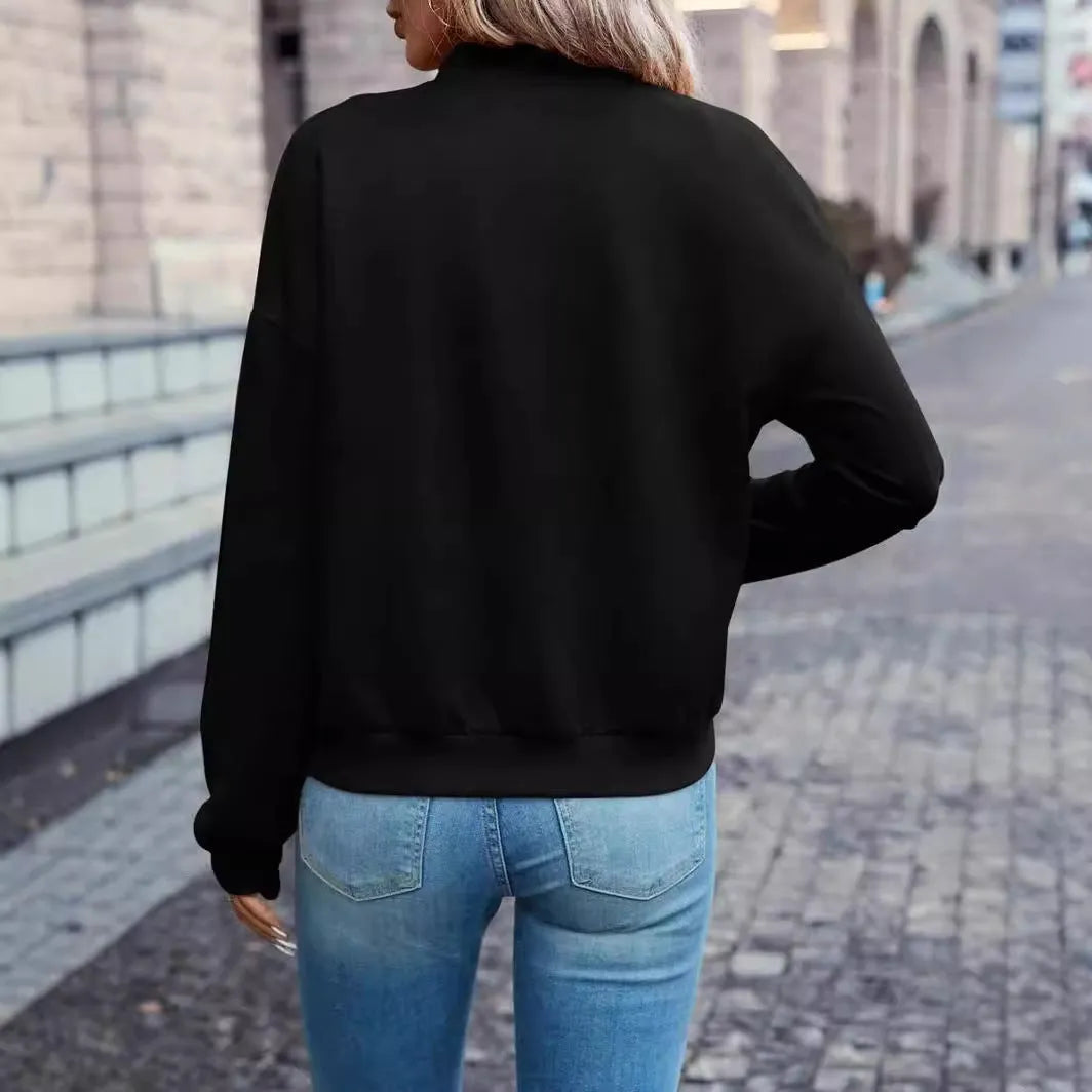 Women's black polyester zip jacket with long sleeves and faux pocket detailing