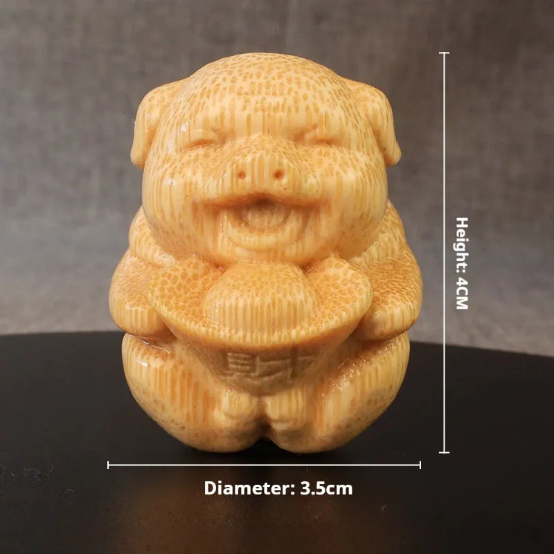 Solid bamboo carving ornament with cute pig ingot design measuring 4cm in height