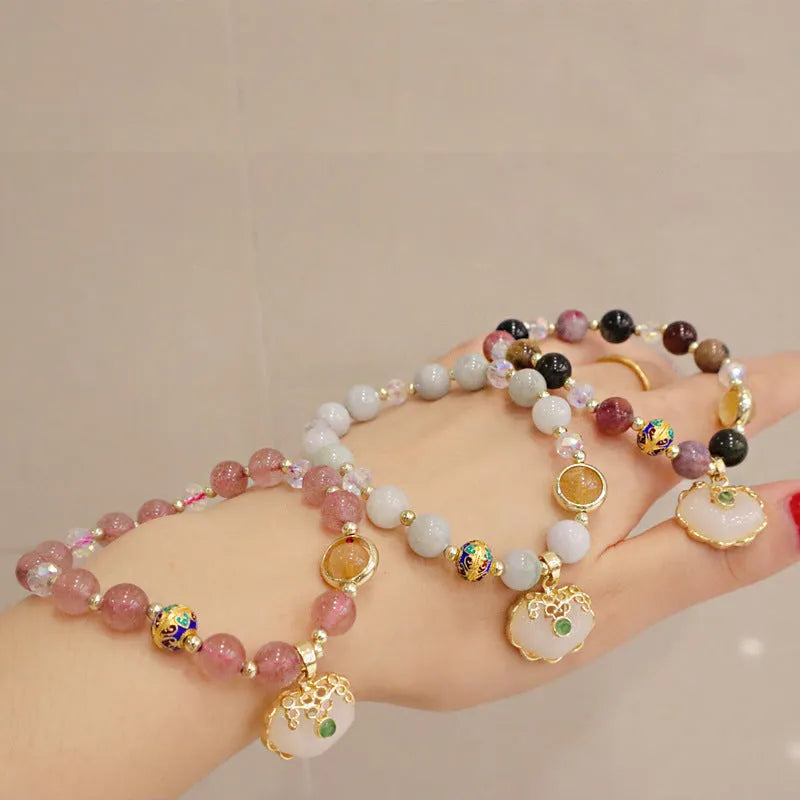 Geometric women's bracelet in gray Jade or Strawberry Quartz with three-dimensional ethnic metal decorations