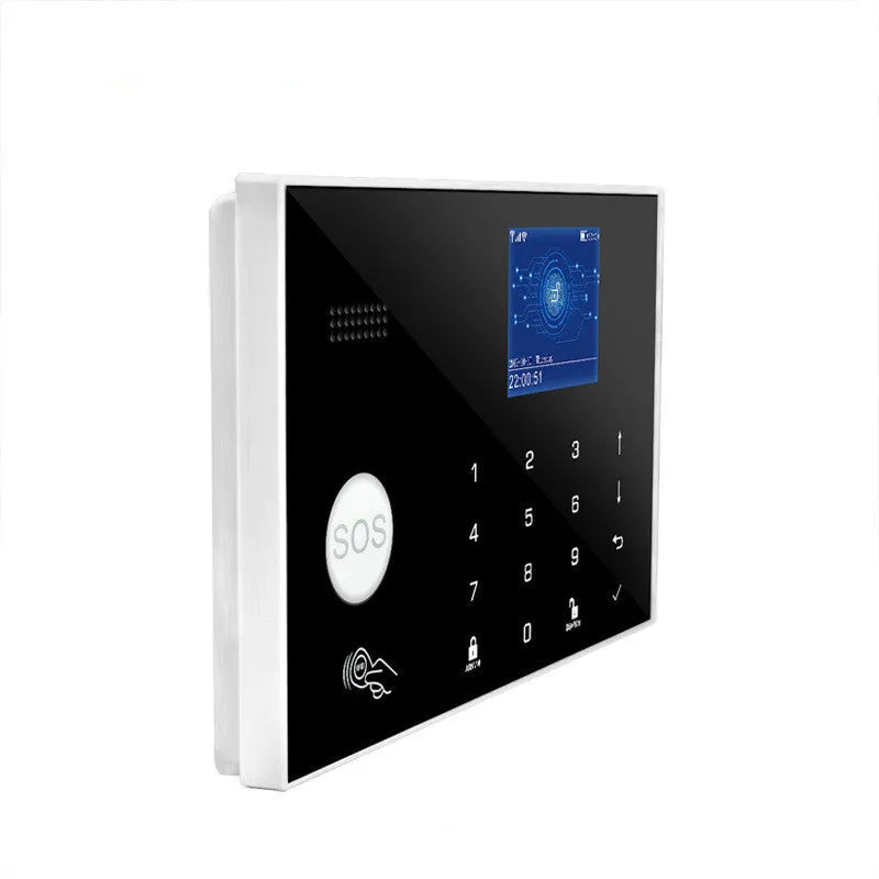 Intelligent WiFi GSM touch button household burglar alarm host unit on a table.