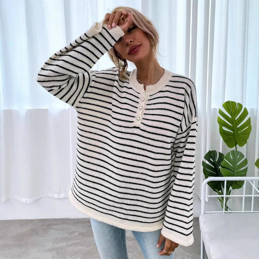 Black striped women's casual long sleeve top with drop shoulders and button details