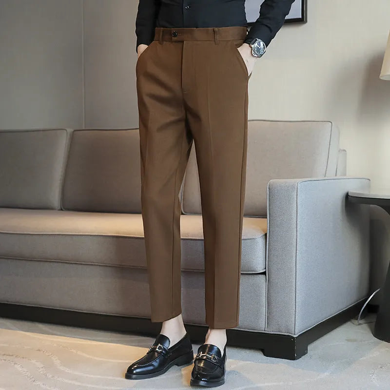 Men's straight fit brown corduroy trousers with elastic waistband on hanger