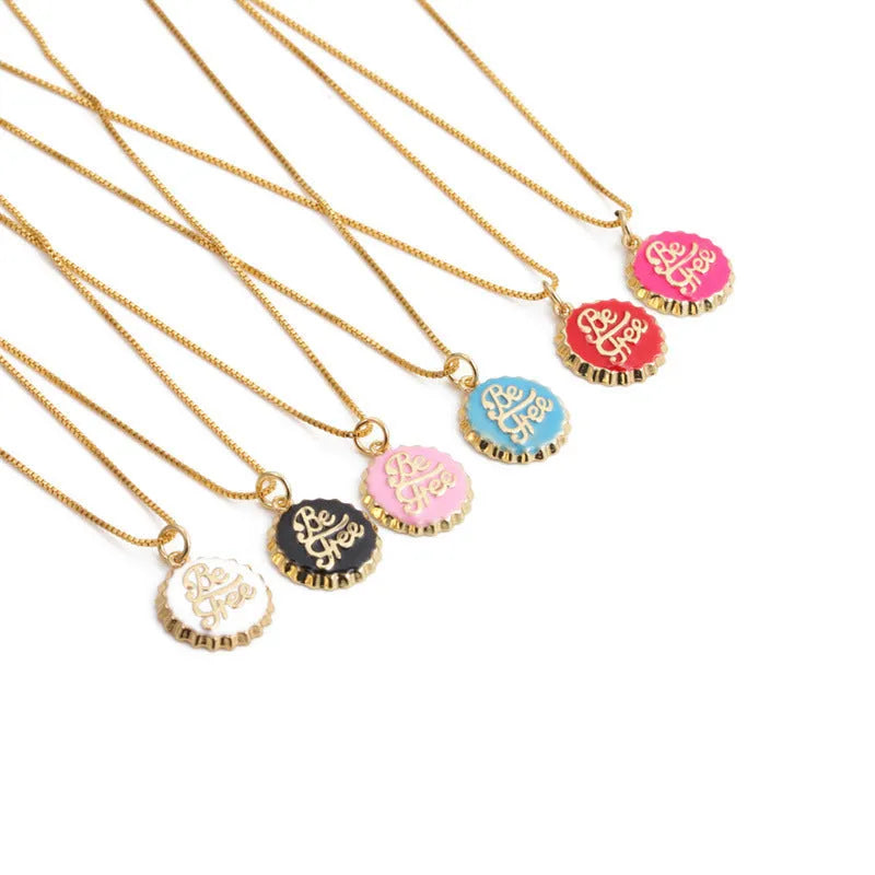 Copper bottle cap pendant necklace with gold plating on a 40cm box chain.