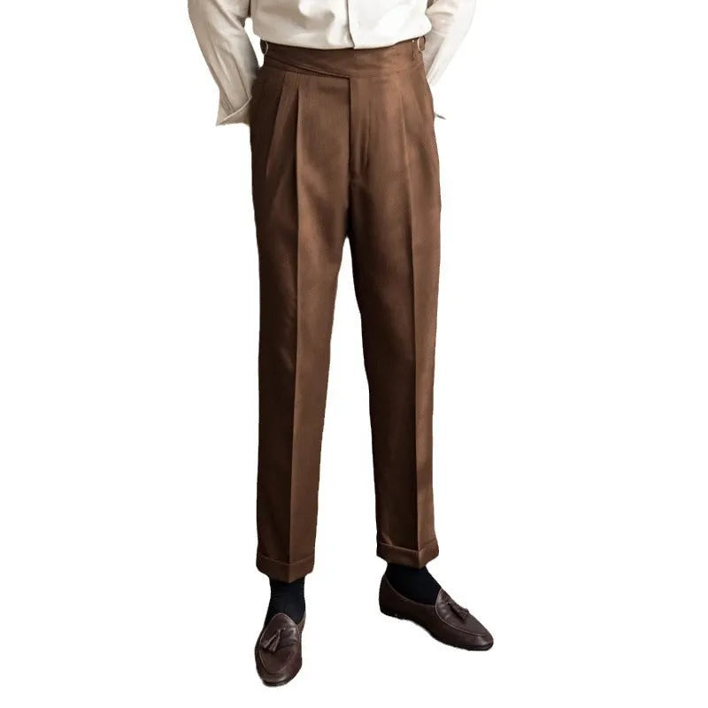 Man wearing black high-waisted straight-leg casual polyester trousers.