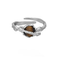 Women's adjustable silver ring with Saturn and Tigereye design in white gold electroplated finish