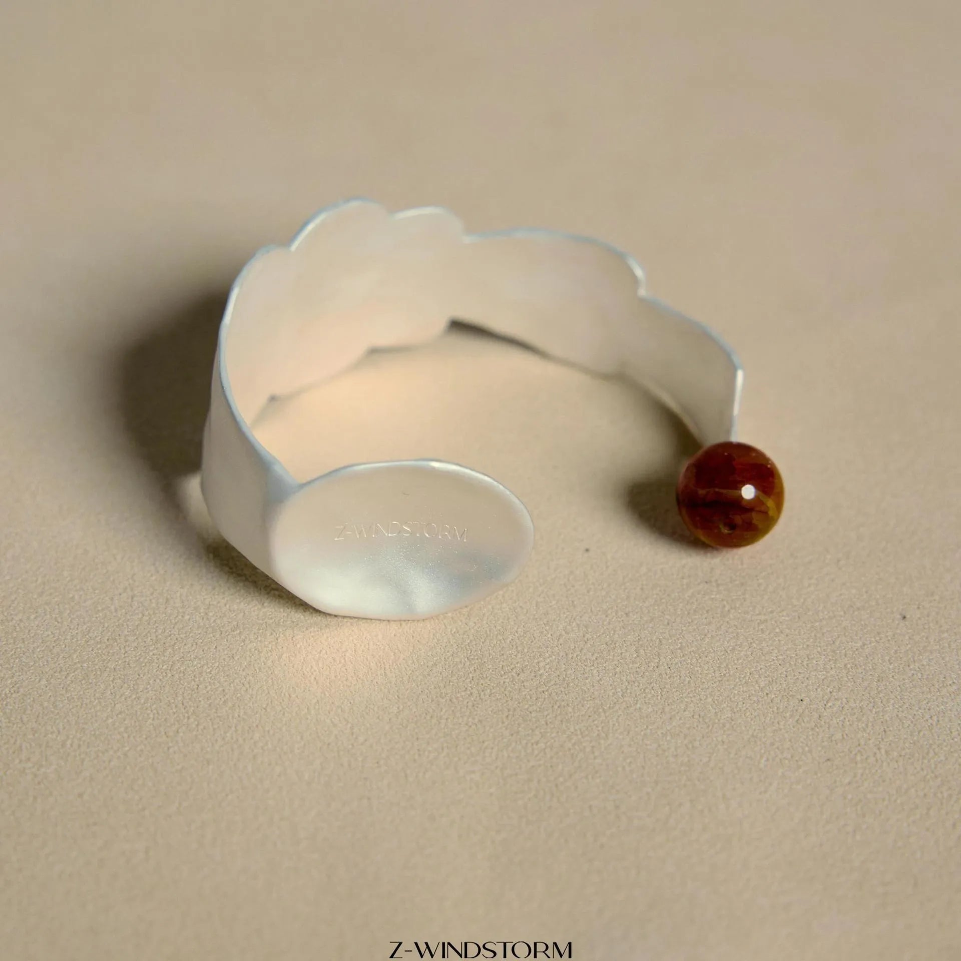 Silver-toned electroplated alloy ring and bracelet set with diamond shape design