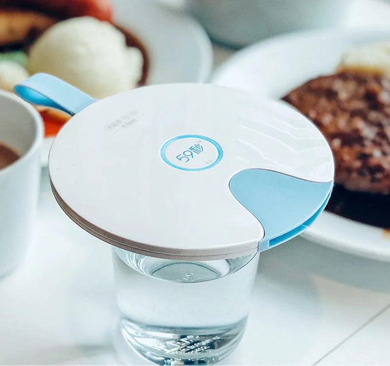 Portable UV baby bottle sterilizer showing compact design with USB port and measuring 163.6mm x 120mm