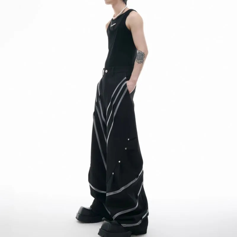 Men's trousers with metal striped rivet pleated design showing three-dimensional cutting detail