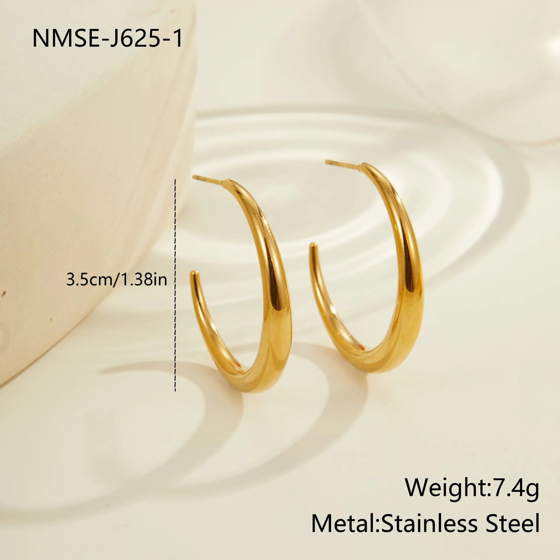 Simple round stainless steel hoop earrings for women in gold and steel colours, available in two sizes.