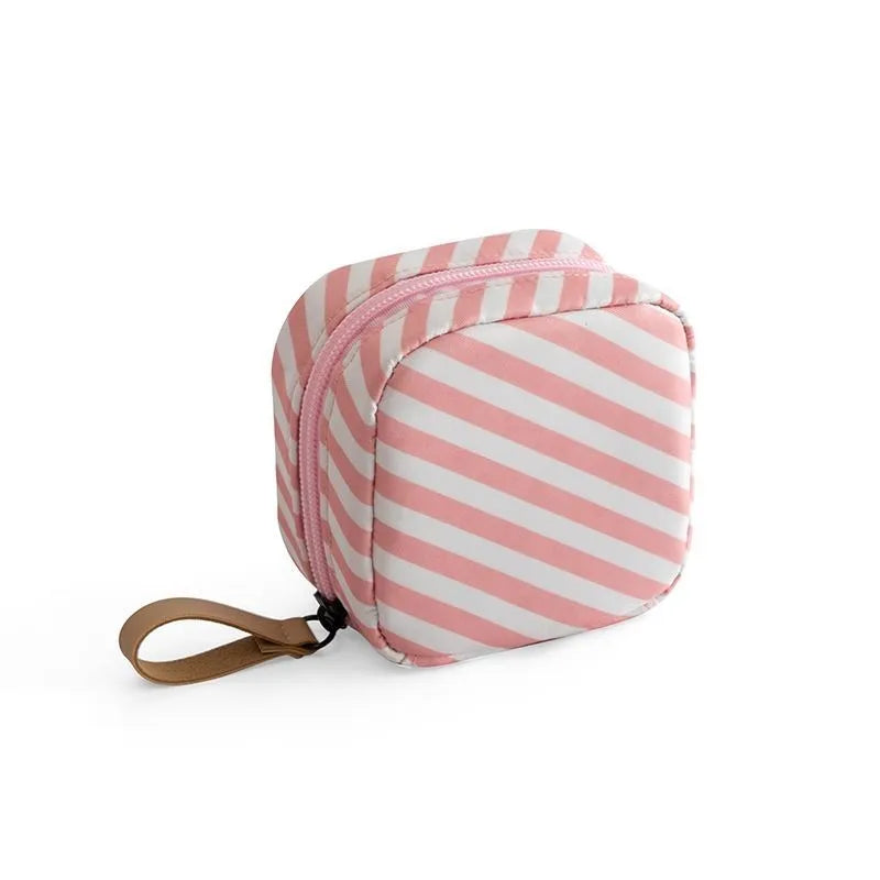 Cloth cube-shaped makeup storage bag in plain design available in multiple colours