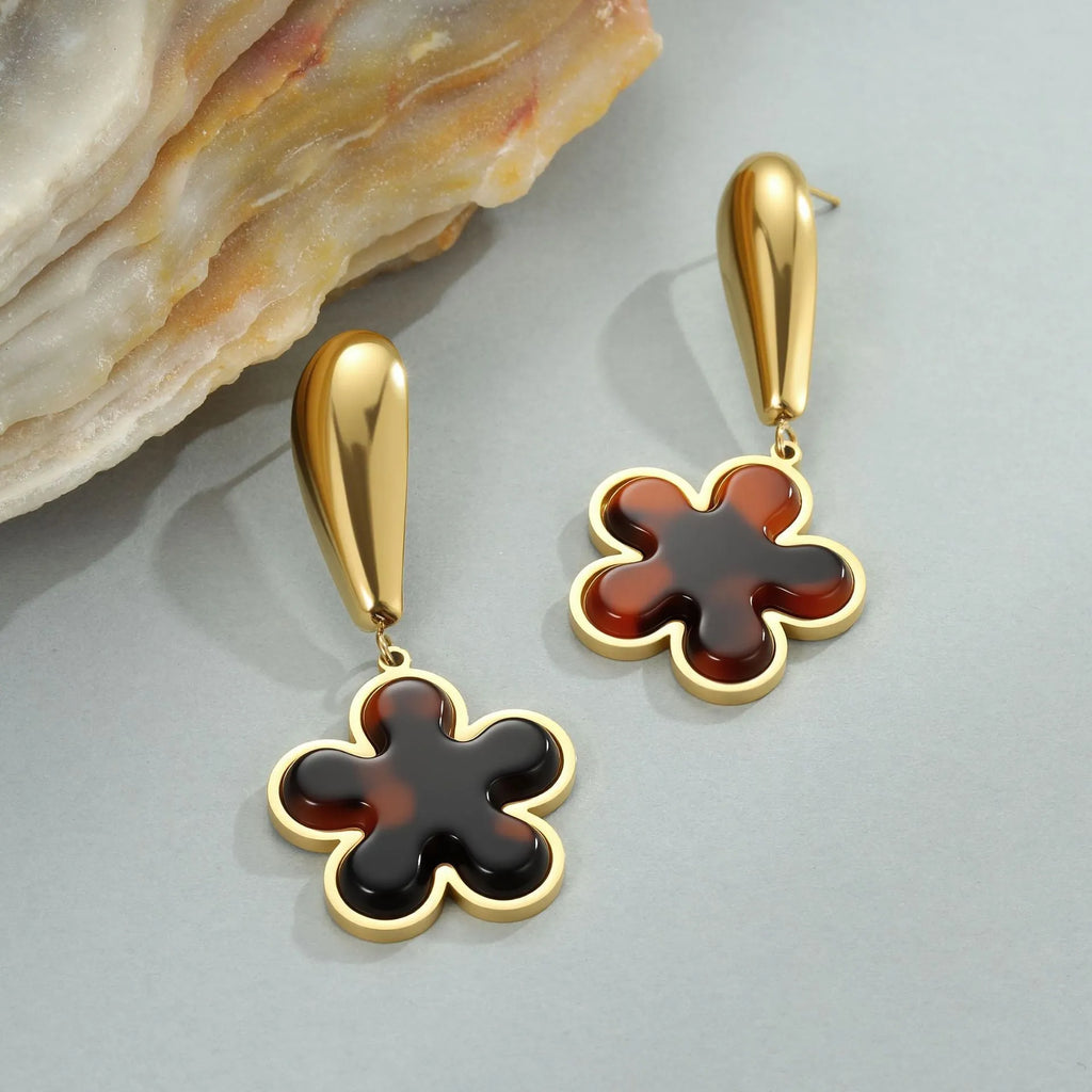 Women's tortoiseshell resin hawksbill colour earrings in heart and flower geometric designs on 18K electroplated stainless steel.
