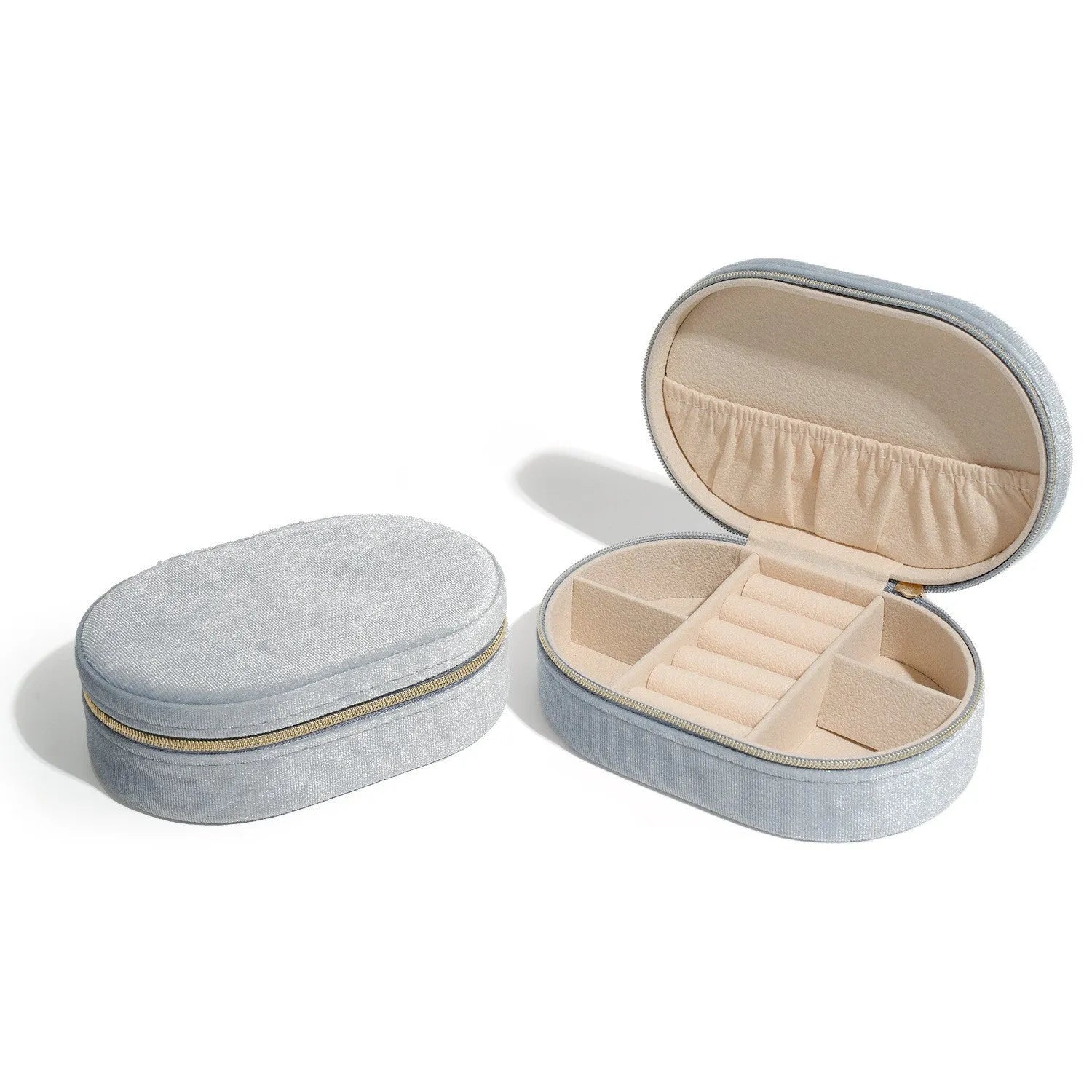 Oval velvet jewellery storage box in lake blue colour with flannel lining, shown with internal hook