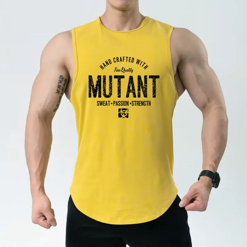 Man wearing a loose grey sleeveless polyester fitness vest for gym workouts.