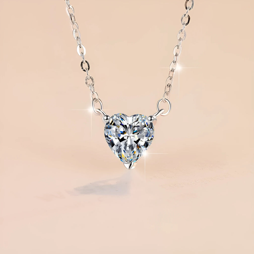 925 silver heart-shaped moissanite pendant necklace with cross chain on display