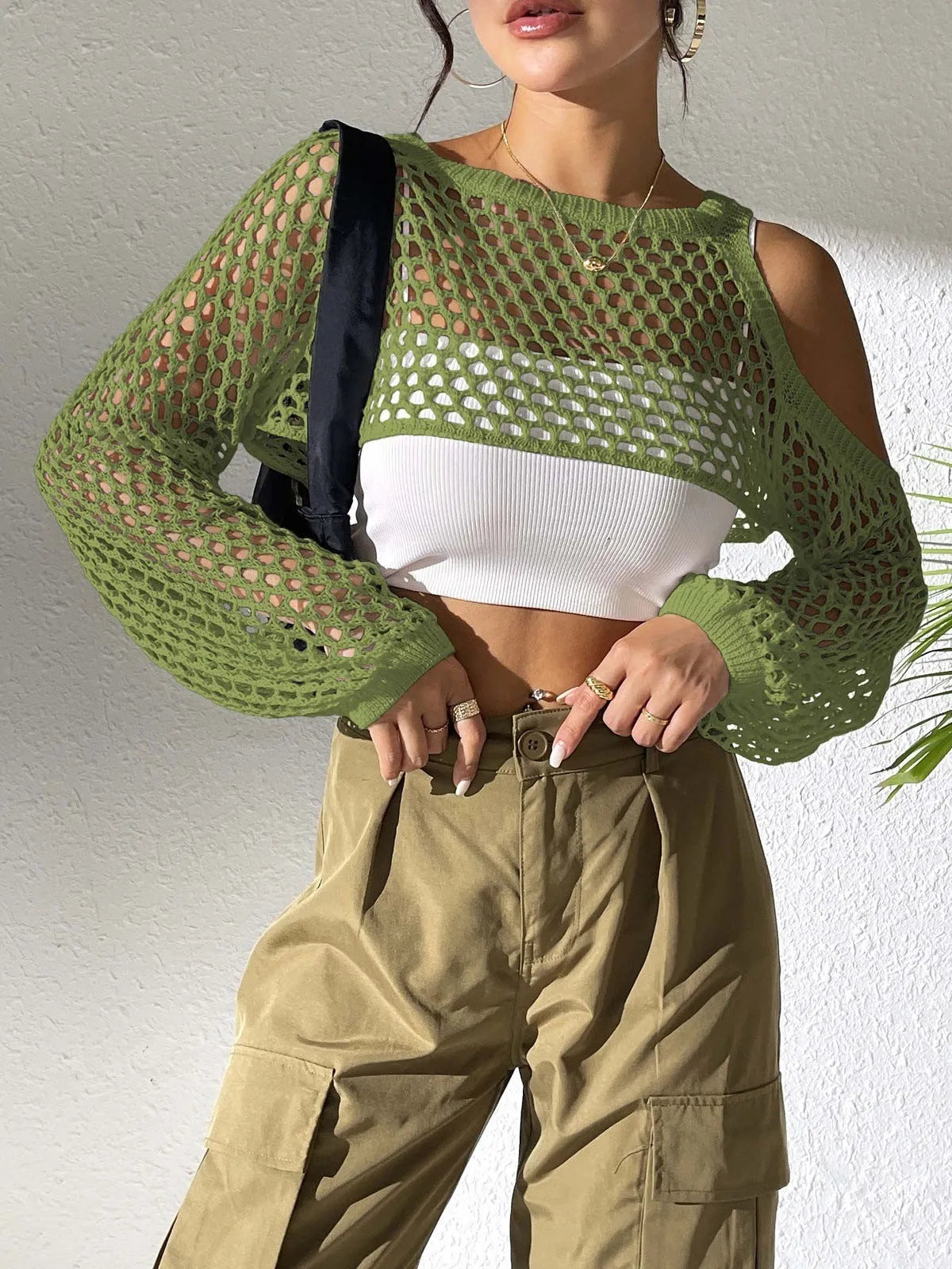 Mesh shirt with a hollowed navel design in a choice of colours including army green, black, and white.