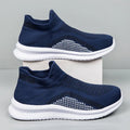 Popcorn flyknit fabric casual sneakers in black, blue, or white on a low-top flat sole.