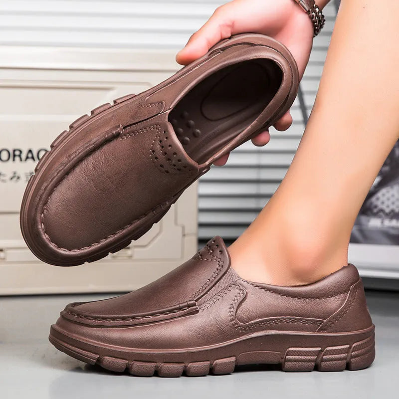 Men's black slip-on platform shoes with an artificial leather upper and a thick EVA sole.