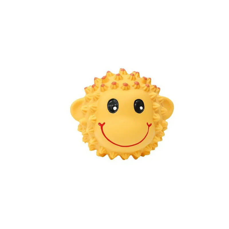 Orange and yellow spiky latex squeaky dog toy approximately 3 inches diameter