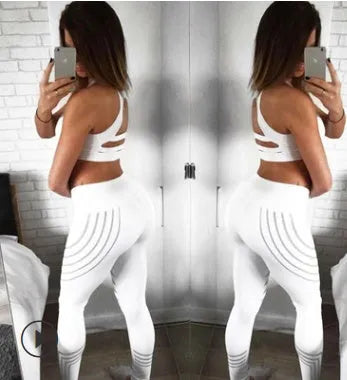 Women's black high-waist workout leggings with night-glowing prints made from milk silk fabric