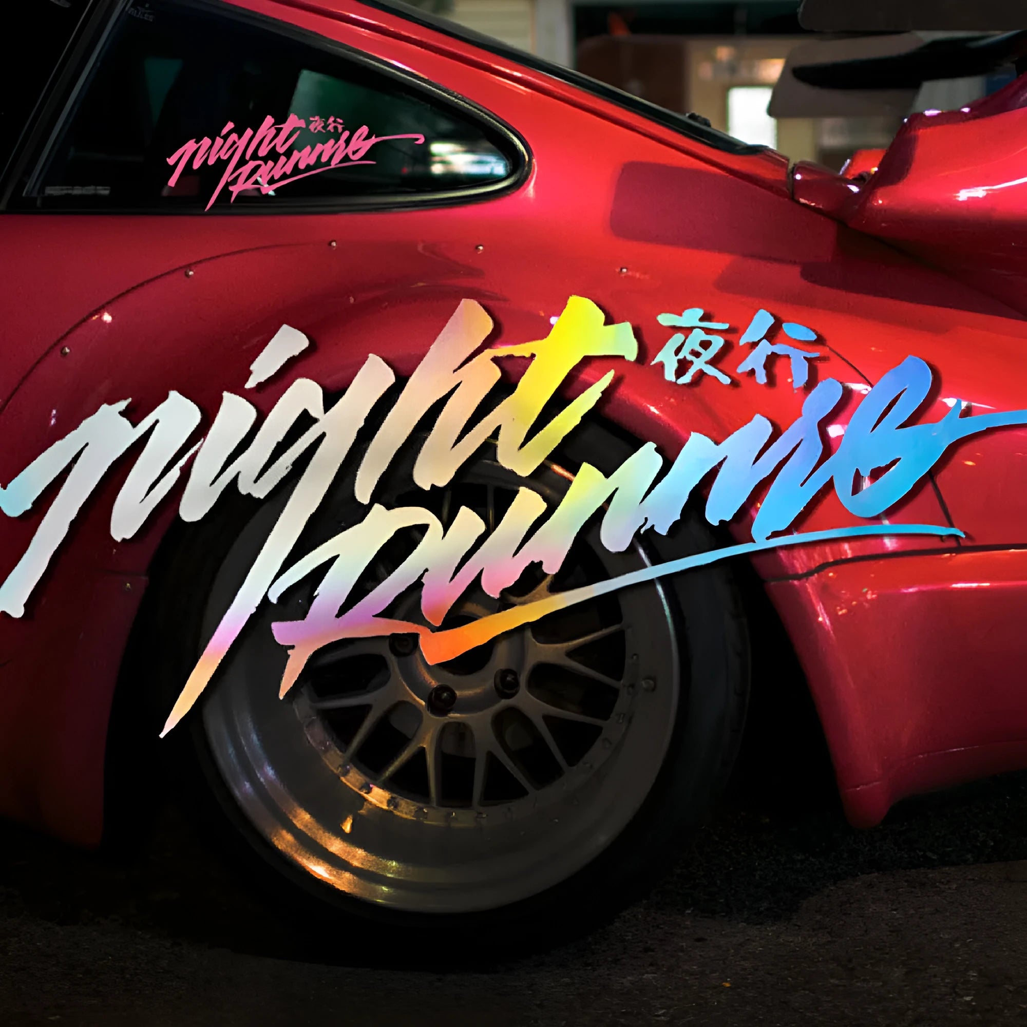 Nightwalker car decal sticker for rear windshield in black, colourful, or pink, showing text example on 20x7.5cm or 32x7.5cm size.