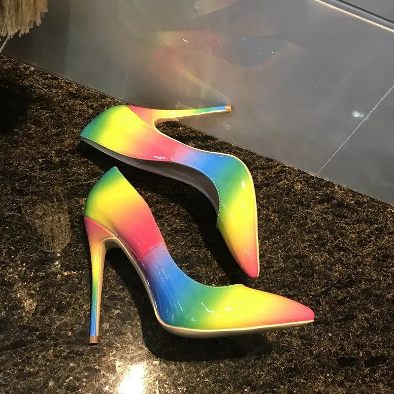 Rainbow glossy patent leather high heel shoes with pointed toe and thin ultra-high heel.