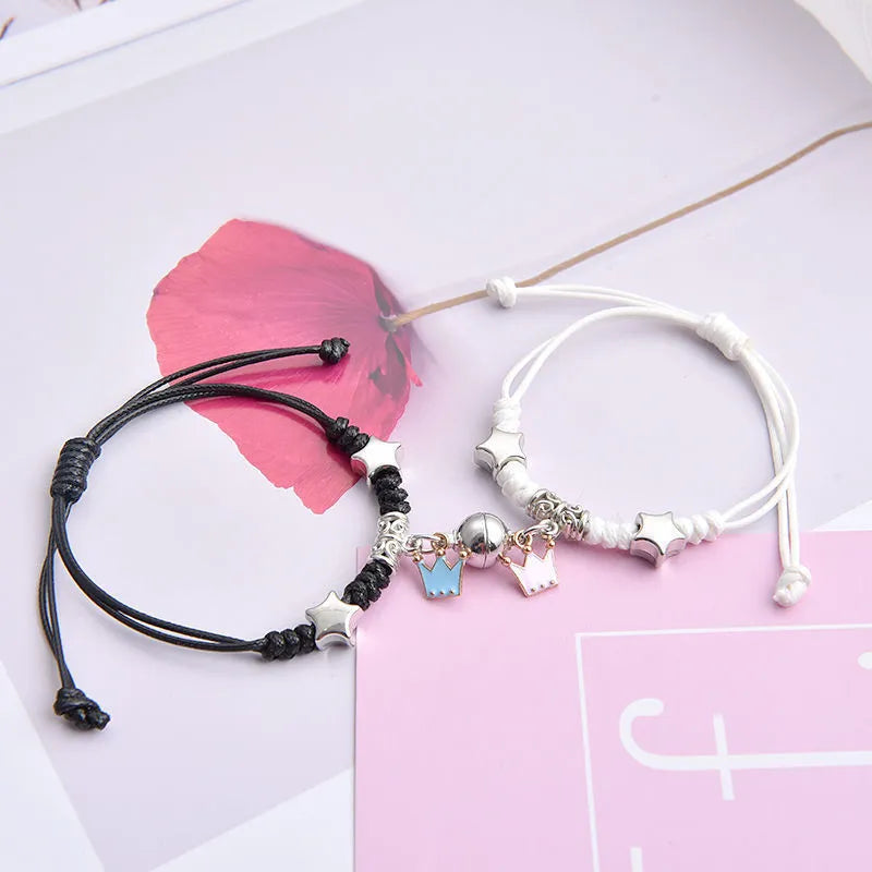 Electroplated alloy suction cup couple bracelets with crown and diamond designs