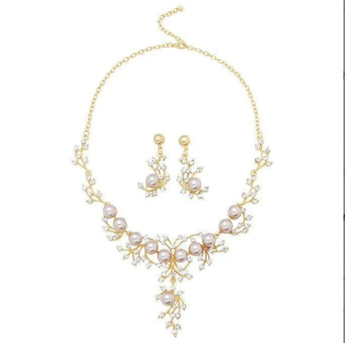 Women's fashion necklace and earrings set in gold or white with alloy construction and floral pattern