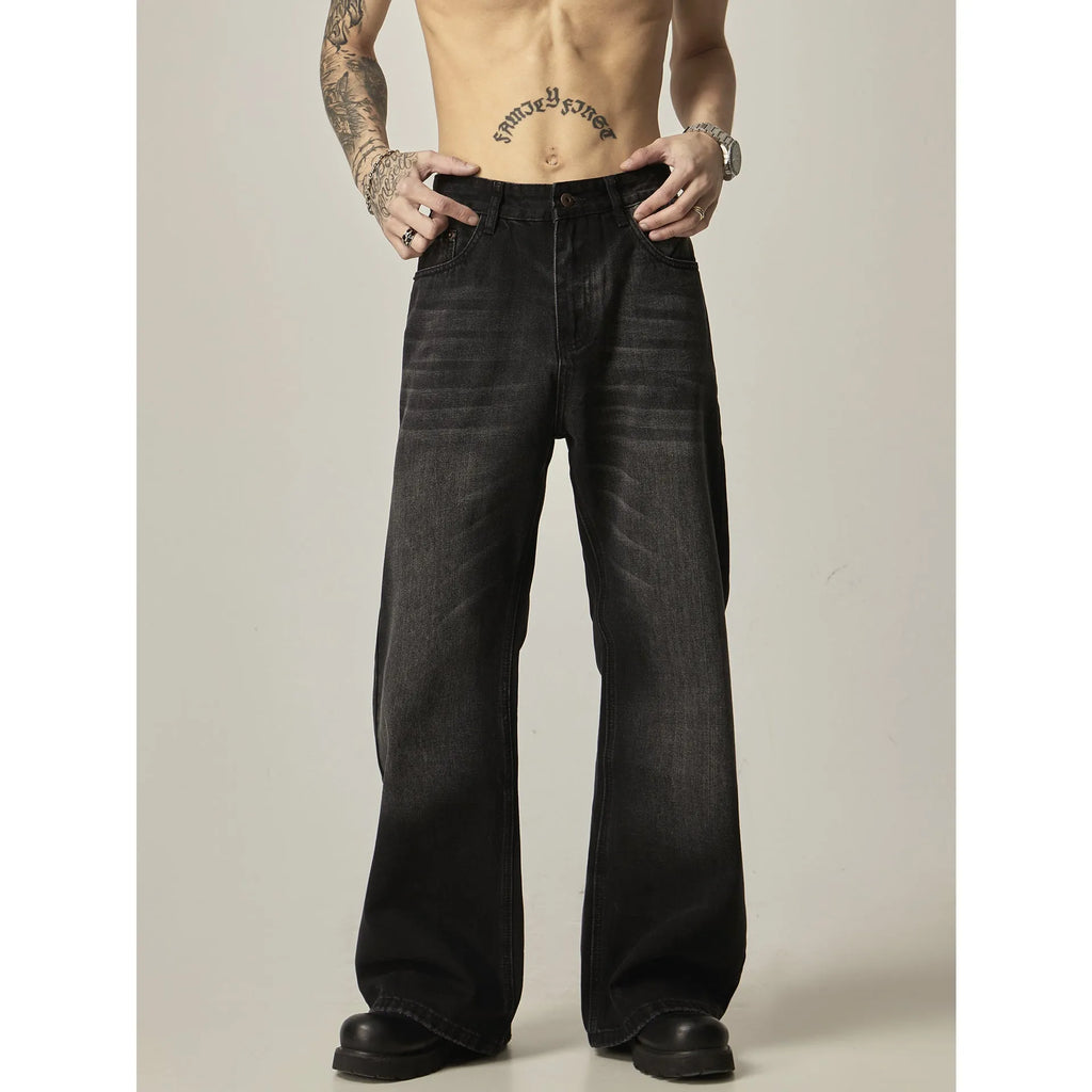 Black loose straight jeans with retro styling and zipper fly in polyester denim fabric