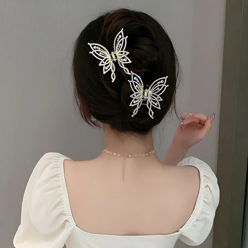 Butterfly hair barrettes in alloy measuring 6.7 by 6.2 cm with decorative elements