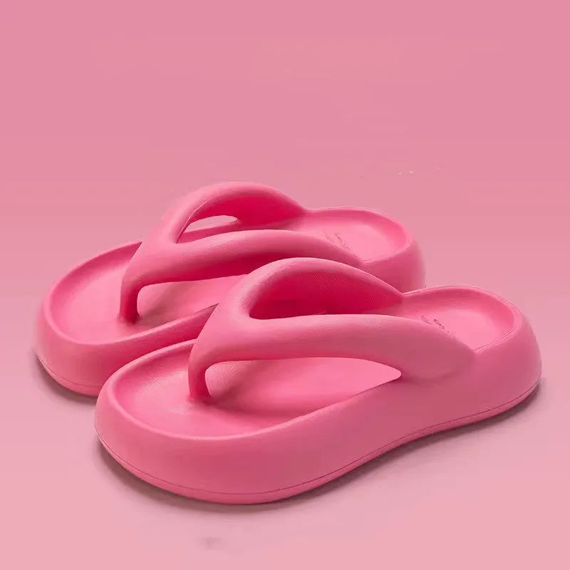 Solid colour thick-soled EVA flip-flops with a bow on the strap, shown on a white background.