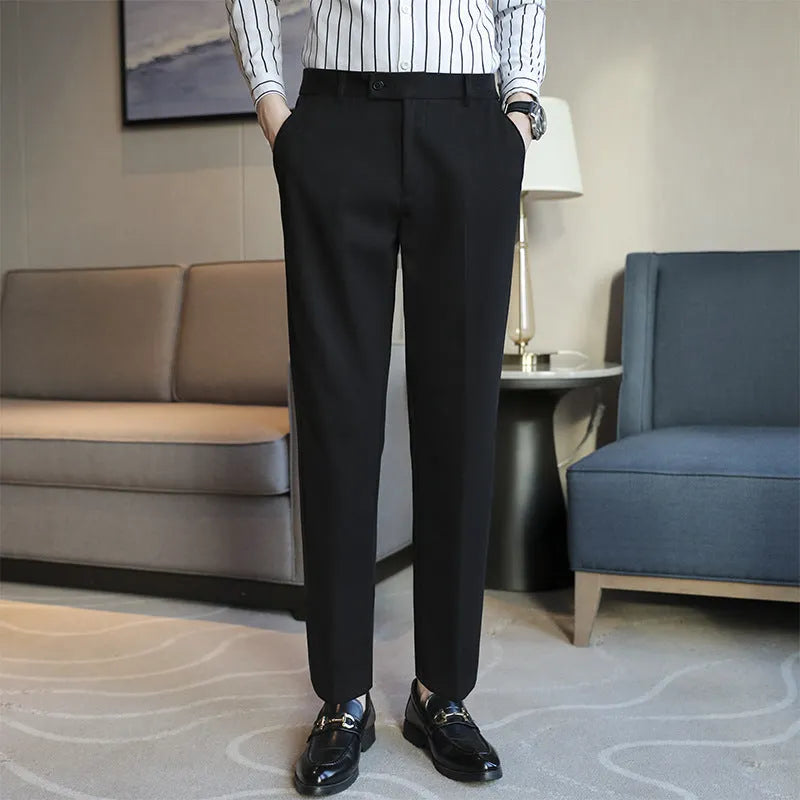 Men's straight fit brown corduroy trousers with elastic waistband on hanger