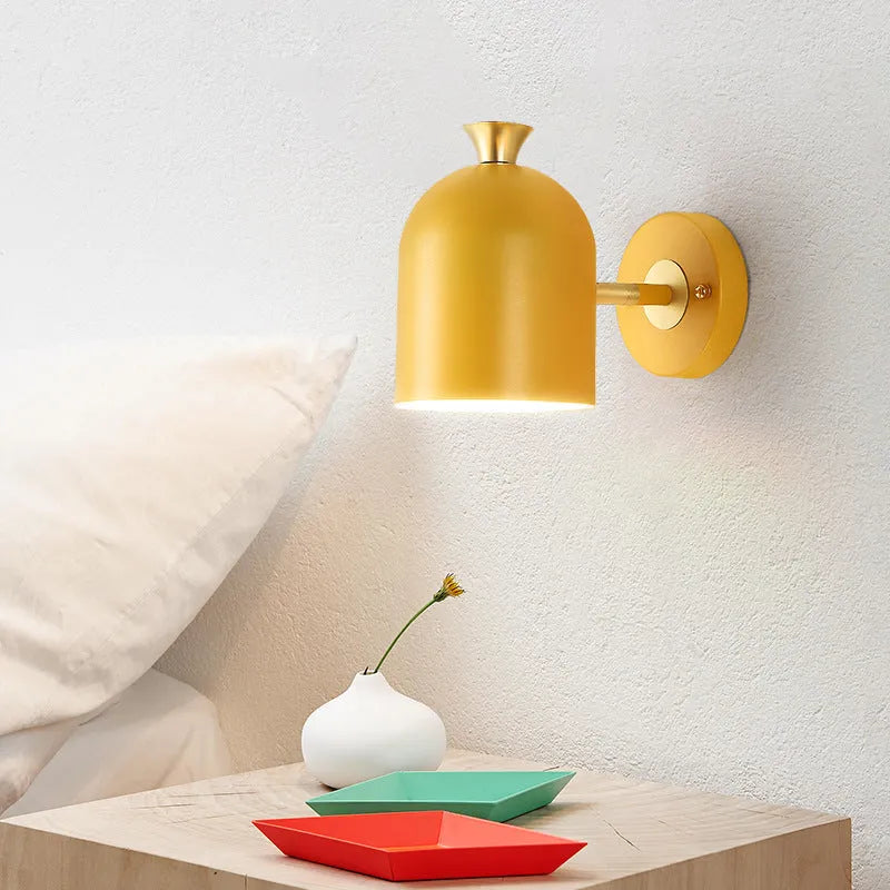 Circular aluminium bedside wall lamp with mirror front in choice of blue, green, pink or yellow finish