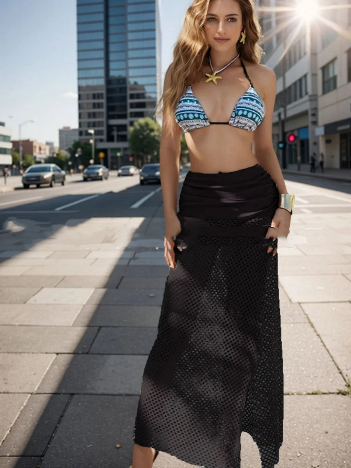 Women's brown, pink, and black three-piece bikini set with a fishnet long skirt on a size chart.