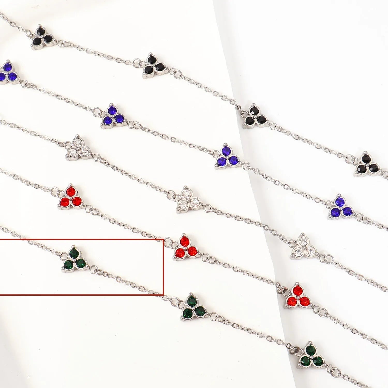 Women's stainless steel bracelet with three geometric diamond designs in various colour options