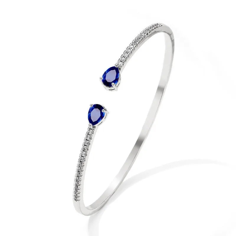 Personalised multi-zircon bracelet in blue or white colour on a copper band with simple style