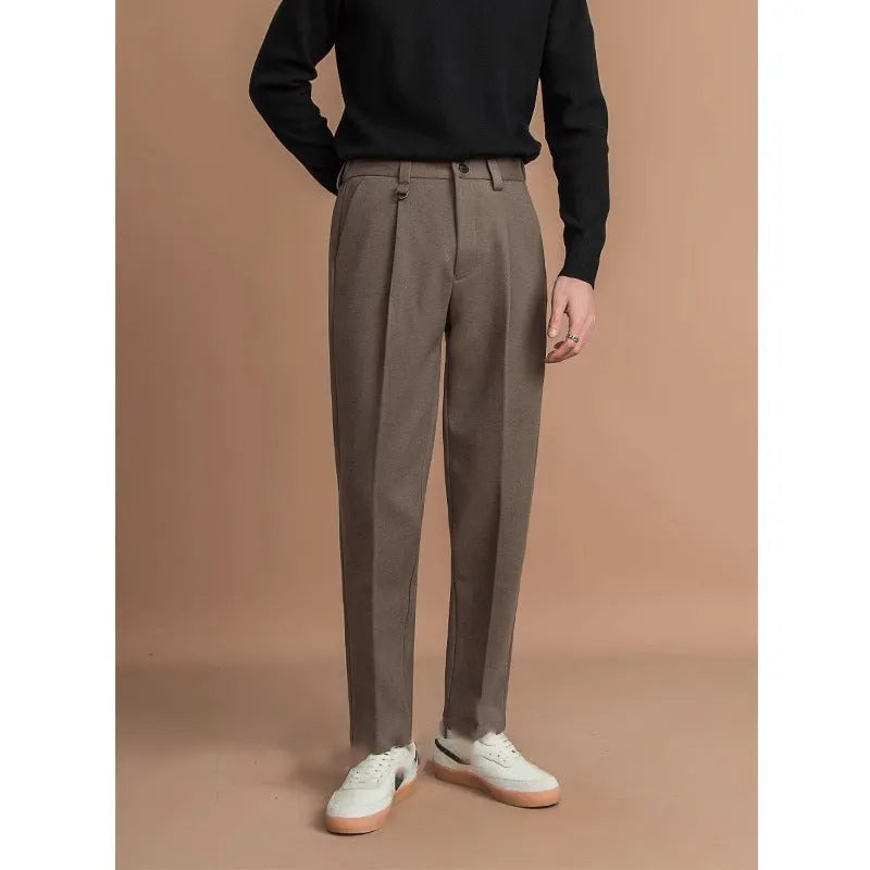 Man wearing straight-leg black polyester suit pants for business casual attire