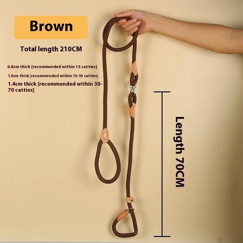 Brown nylon dog leash with P chain hand holding rope, shown at full 2.1 metre length.