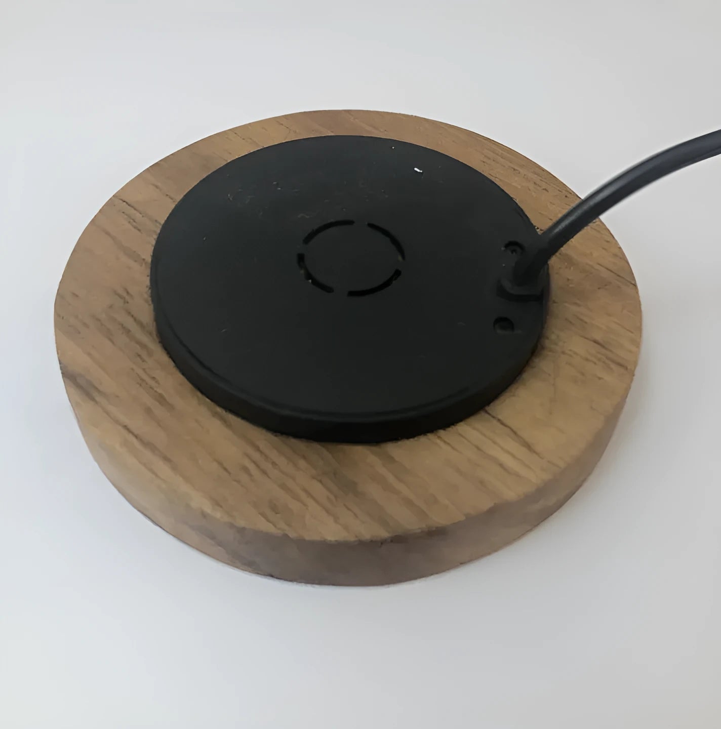 Round 60mm wireless phone charger for embedded installation in furniture