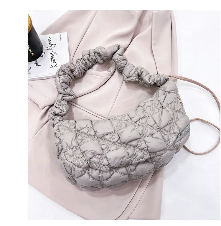 Women's nylon shoulder messenger bag in a solid colour with a long strap, showing front view.