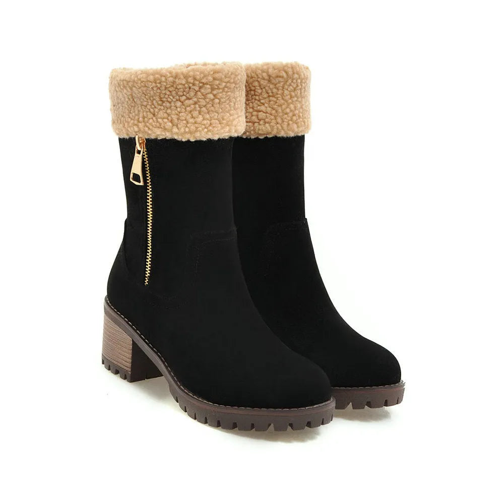 A pair of snow boots with a rubber sole and plush lining on a winter background.