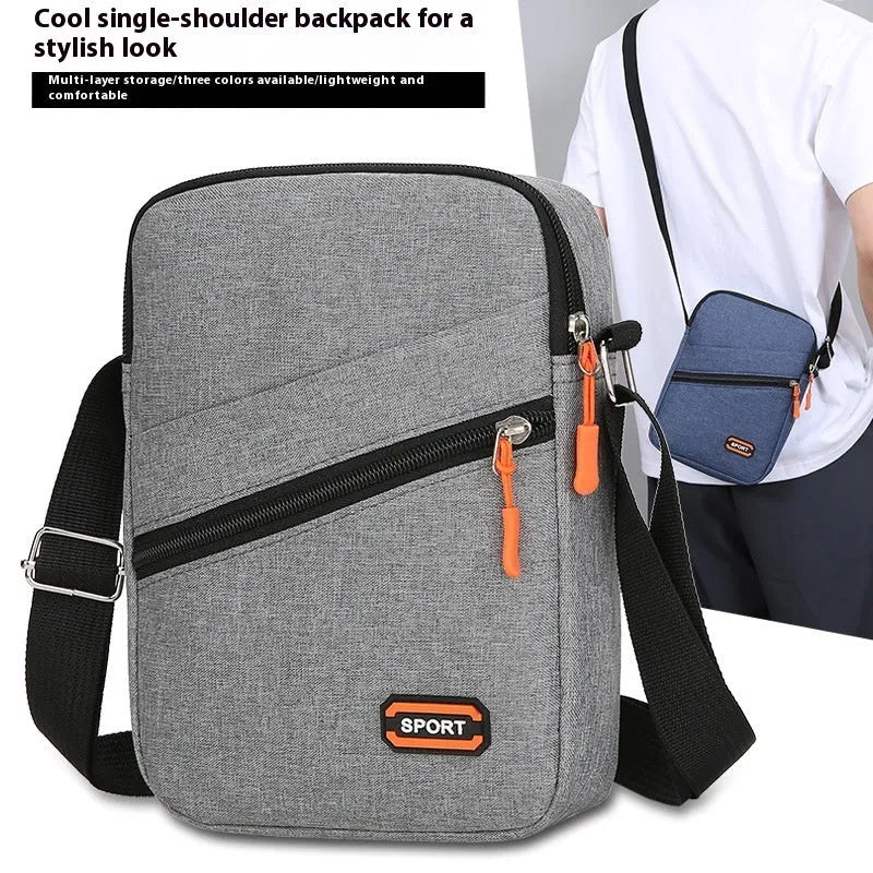 Lightweight Oxford cloth crossbody commuter bag in urban simplicity style.