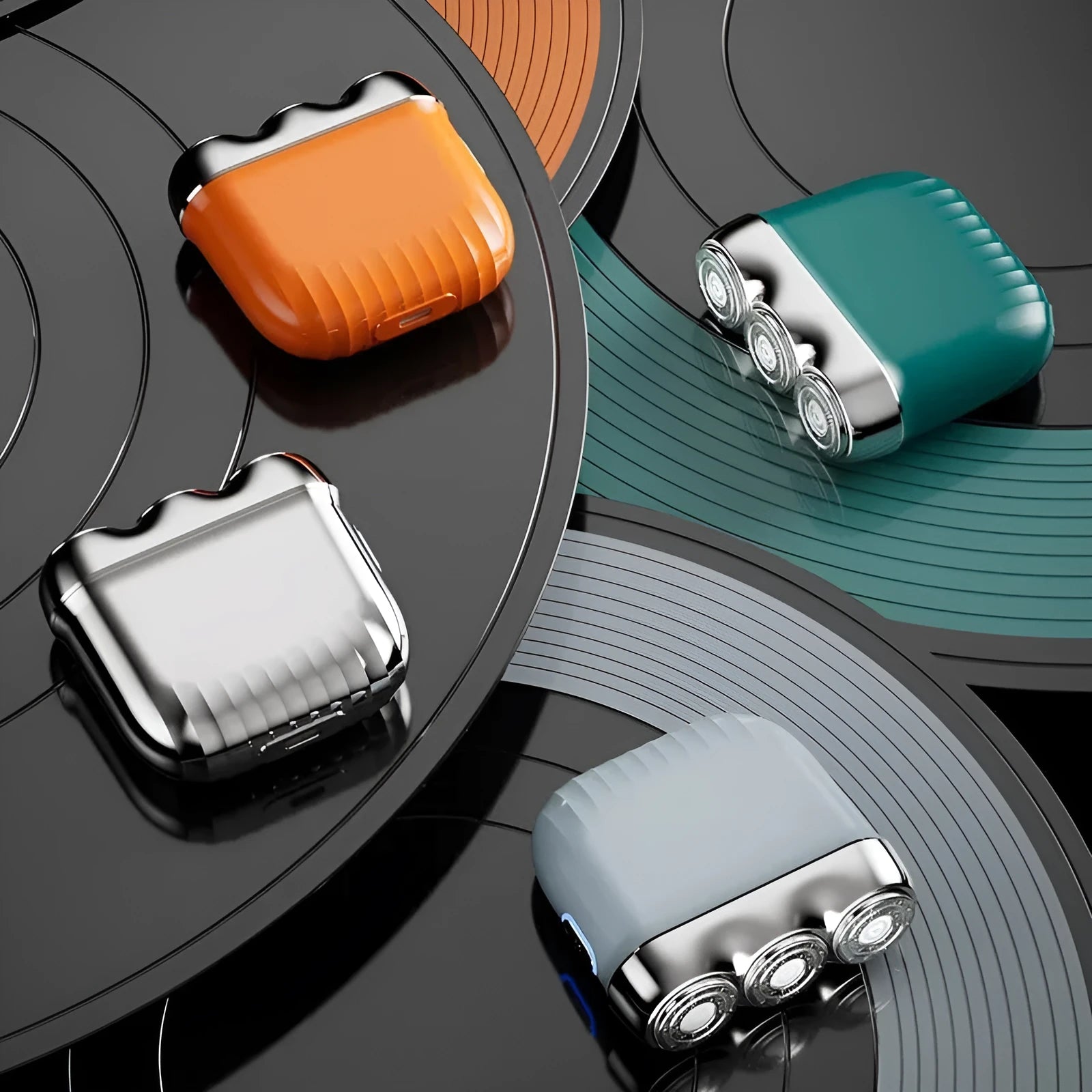 Three-head magnetic electric shaver in gun metal, orange, green or blue colours with floating cutter adjustment