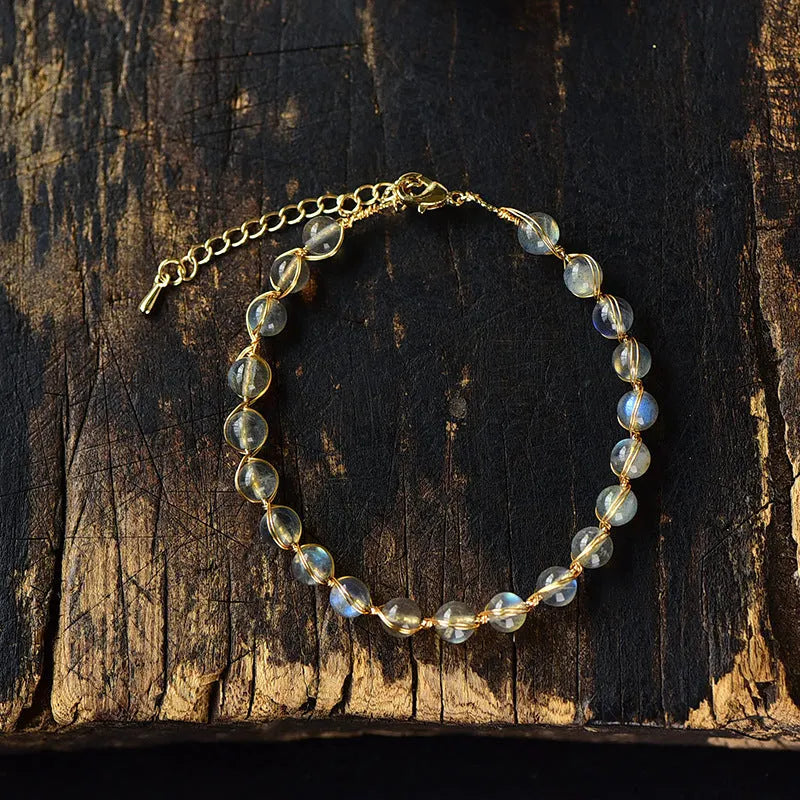 Women's 14K gilded bracelet with natural crystal blue moonstone gemstones in starry sky design