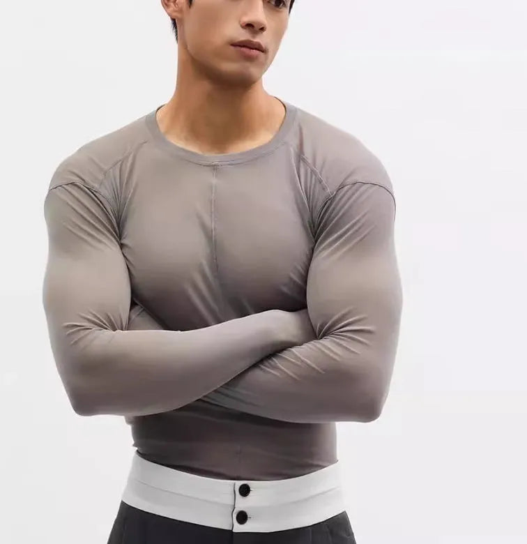 Black women's slim-fit pullover with mesh see-through texture and long sleeves.