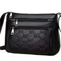 Butterfly black PU leather women's crossbody messenger bag with embossed design and horizontal square shape