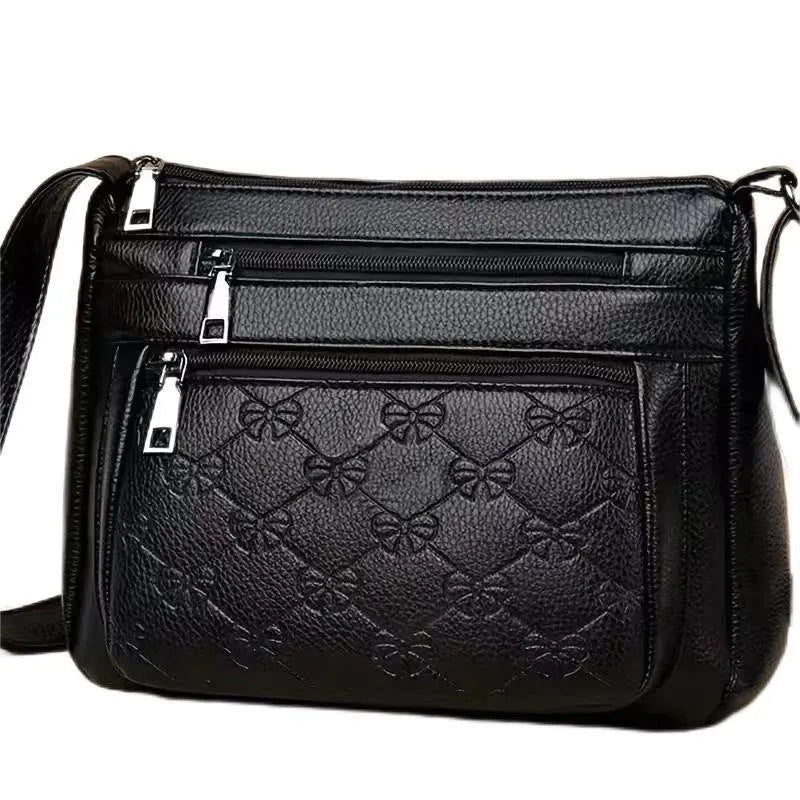 Butterfly black PU leather women's crossbody messenger bag with embossed design and horizontal square shape